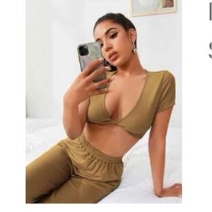 Plunging neck twist hem crop top